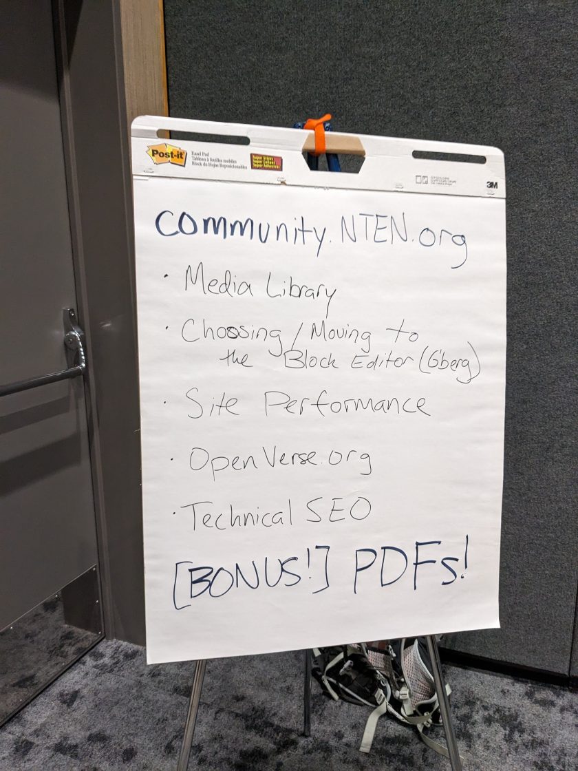 A easel notepad with a list of discussion topics for the WordPress community lean coffee session.